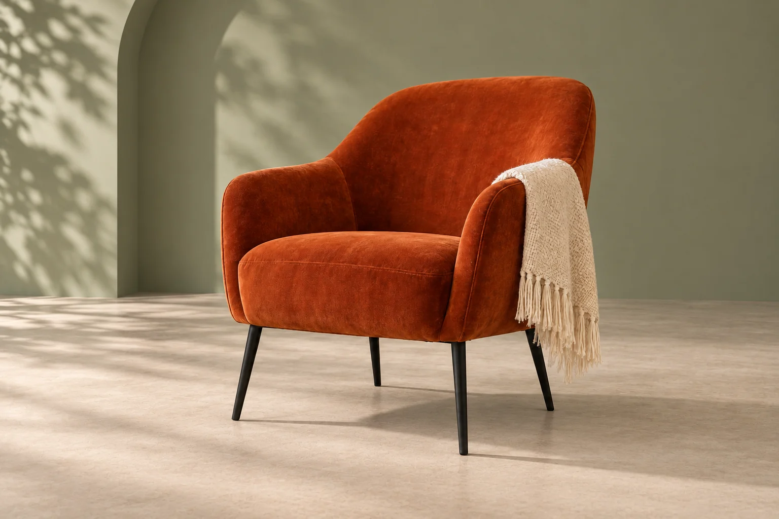 Orange velvet armchair placed in a clean sage studio after AI background replacement